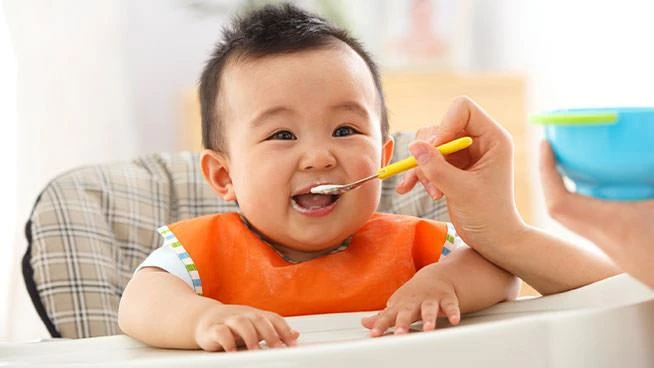 Baby-Eating-Baby-Food-Eagerly - Feeding My Kid